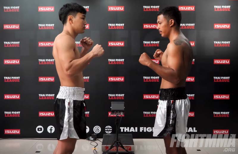 Two Muay Thai fighters face off at the weigh-in